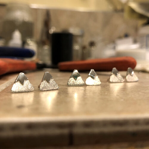 Snowcapped-Mountain-Earrings-Post-Cast-on-tile-top