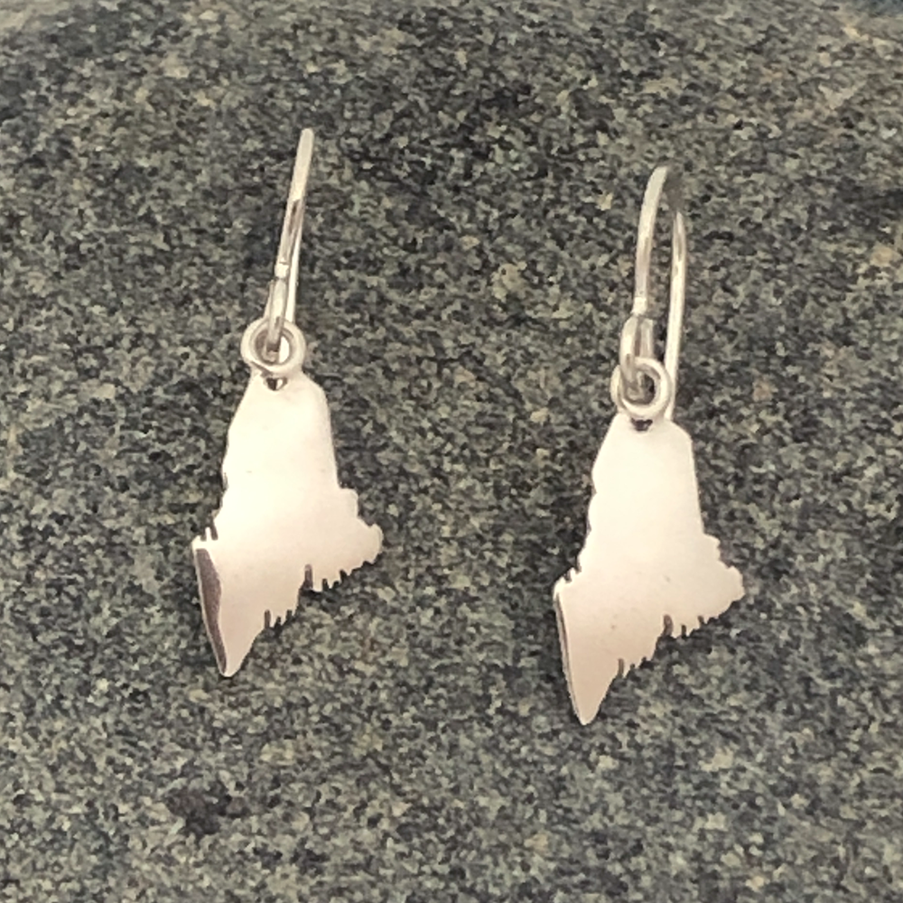 Maine-State-Earrings-Sterling-Silver-on-rock